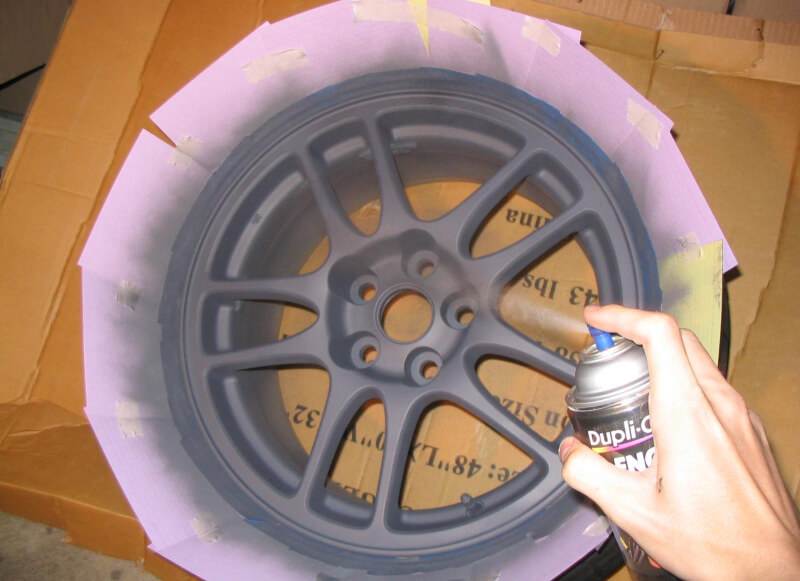 paint-rims-black-with-spray-paint Paint rims black with spray paint.