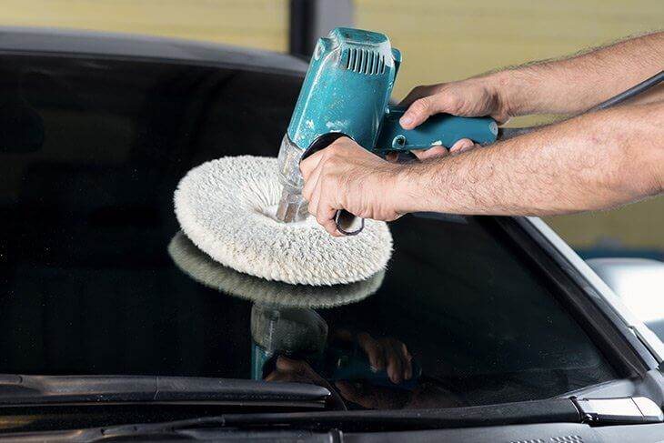 Polish the windshield using orbital or rotary buffer