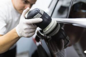 Polish the paint by machine
